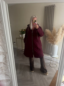 The Bella quilted coat with animal print ties