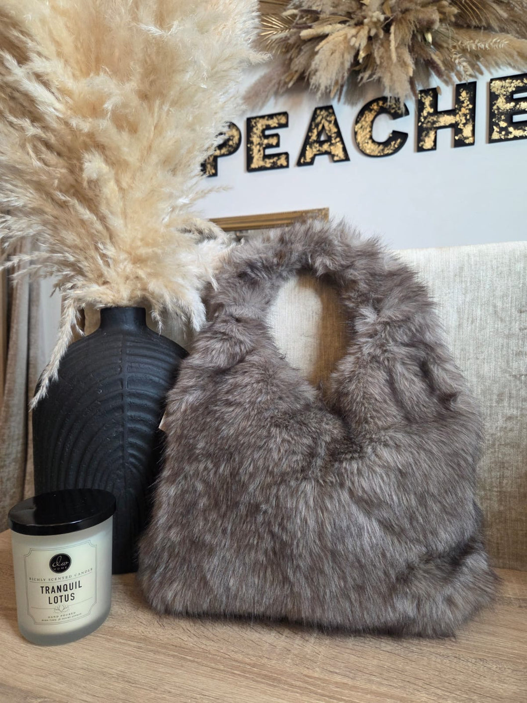 The faux fur shoulder bags