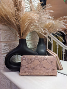 The zip around snake print purse