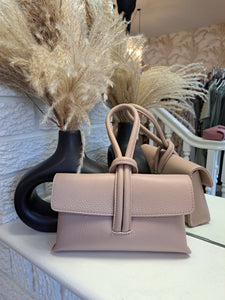 The leather loop clutch bag