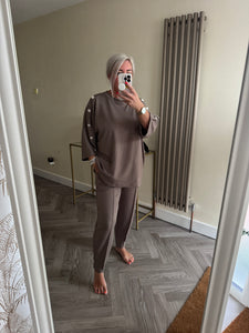 The button detail Mya tracksuits