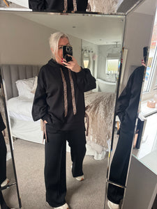 The “Luxe” animal print tie side tracksuit with pin tuck joggers