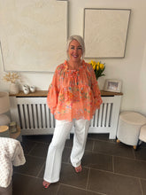 Load image into Gallery viewer, The Meadow floral blouse with tie neck
