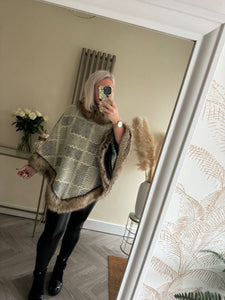 The faux fur trim cape