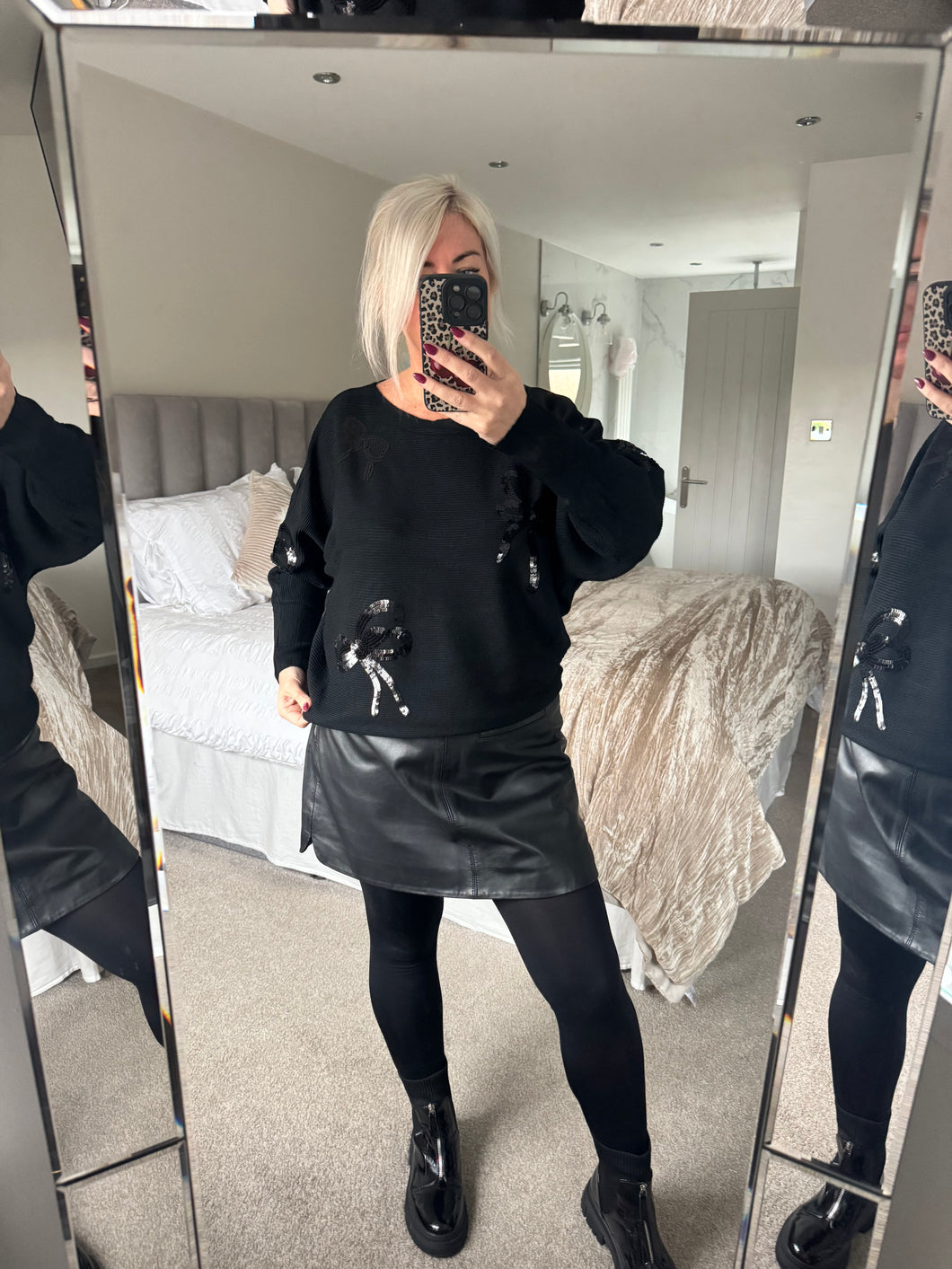 The supersoft sequin bow knit