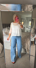 Load image into Gallery viewer, The Palma fine knit dip hem top
