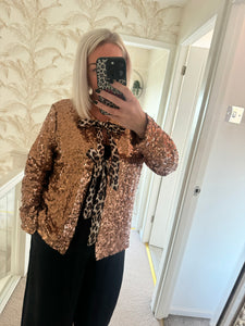 The sequin animal print tie front jacket