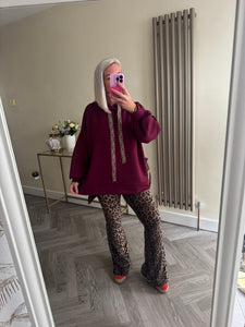 The luxe tie side hoodie with animal print detailing