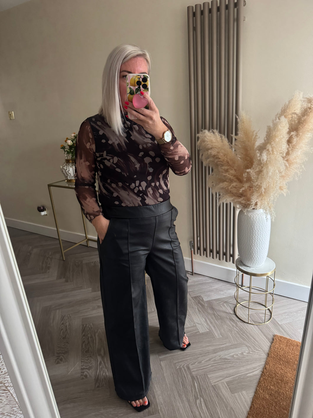 The pu pin tuck trousers