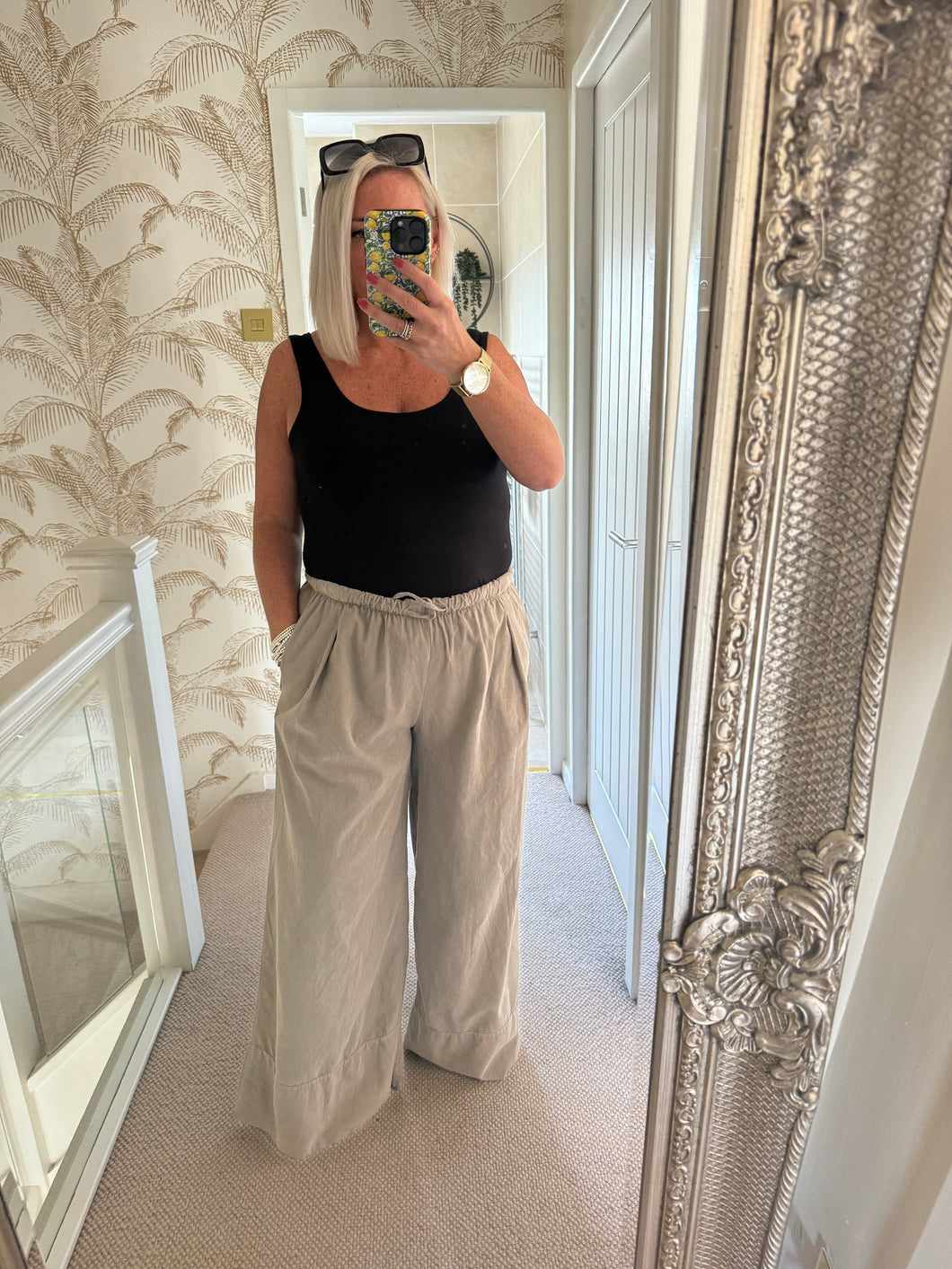 The wide leg cord trousers in mushroom