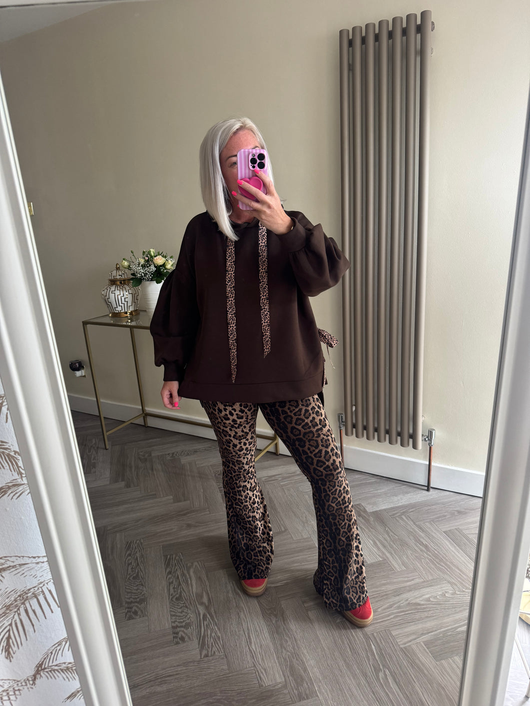 The luxe tie side hoodie with animal print detailing