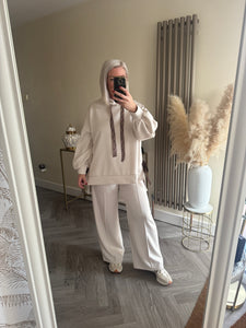 The “Luxe” animal print tie side tracksuit with pin tuck joggers