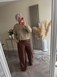 The saints tassel knit in gold