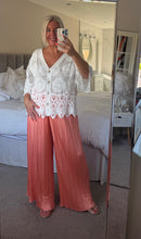 Load image into Gallery viewer, The Bora Bora satin pleated trousers in peach
