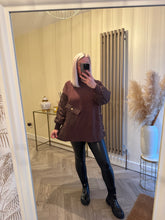 Load image into Gallery viewer, The sports luxe roll neck jumper with cable knit quilted button detailing
