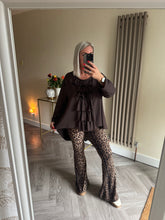 Load image into Gallery viewer, The jersey frill button back top
