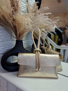 The leather loop clutch bag