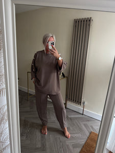 The button detail Mya tracksuits
