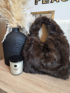 The faux fur shoulder bags